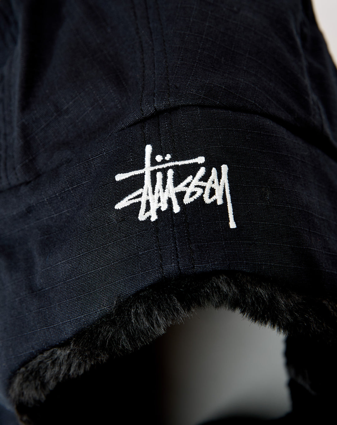 Stüssy Trapper Cap - XHIBITION