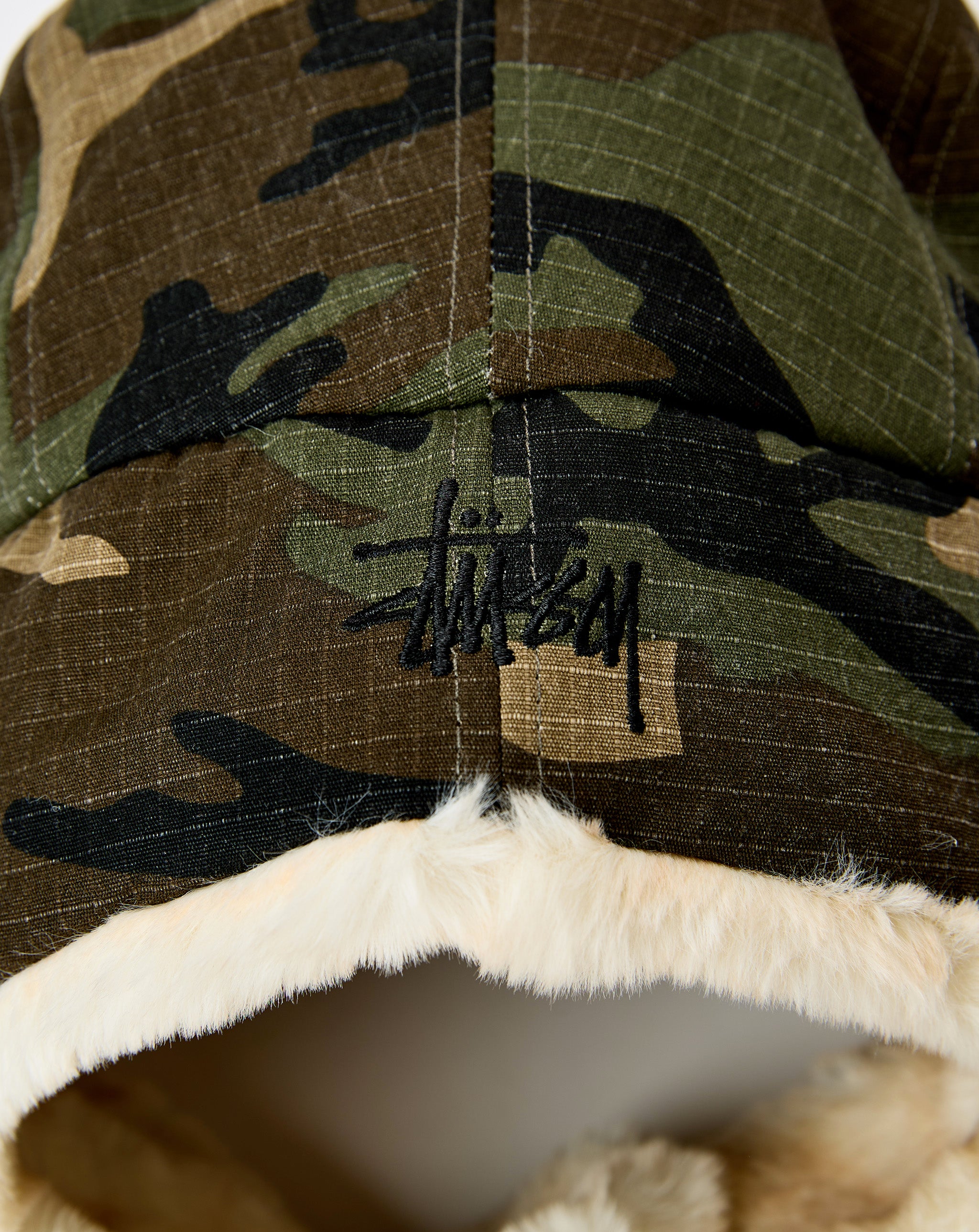 Stüssy Trapper Cap - XHIBITION