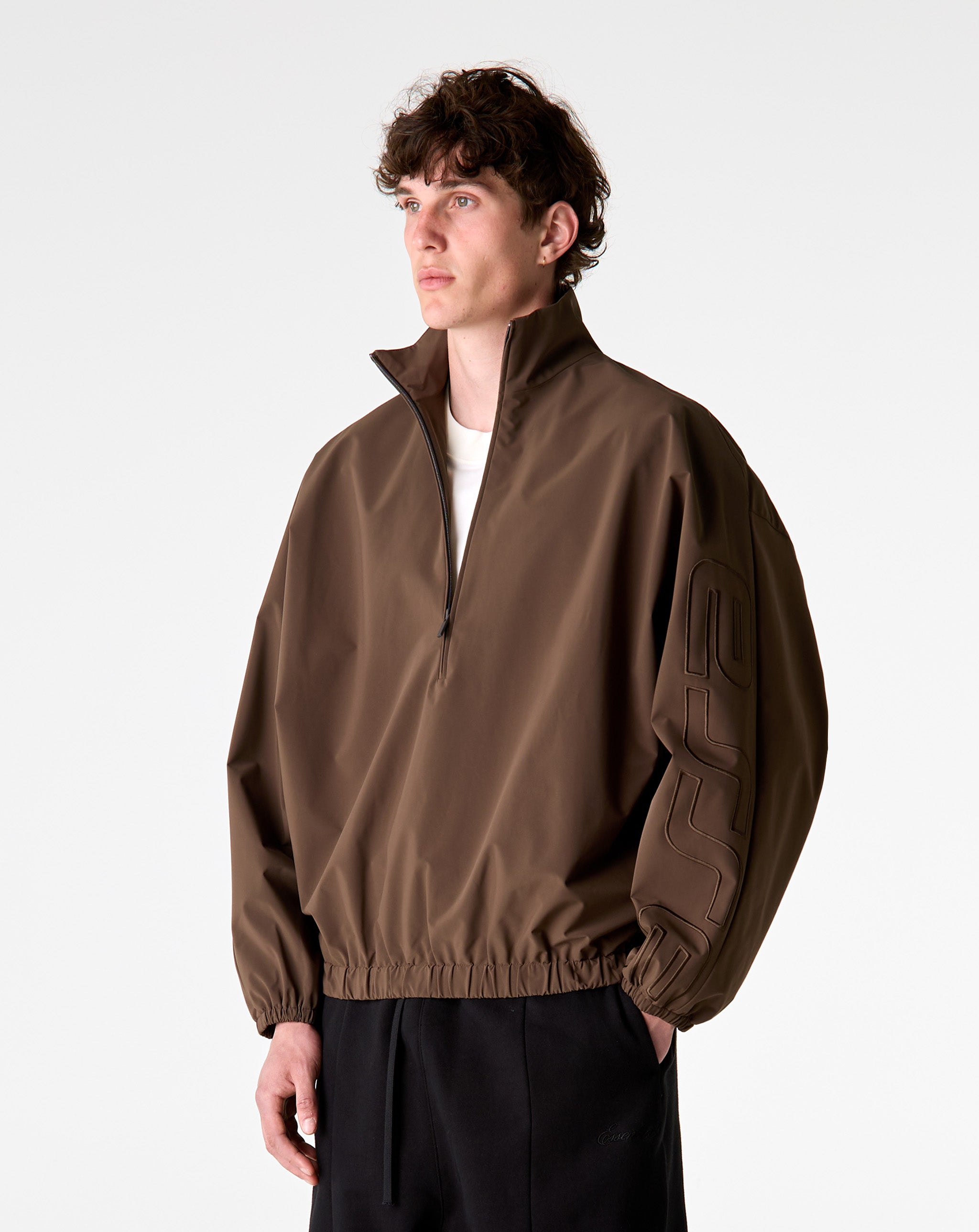 Fear of God Essentials Active Trace 1/2 Zip Track Jacket - XHIBITION