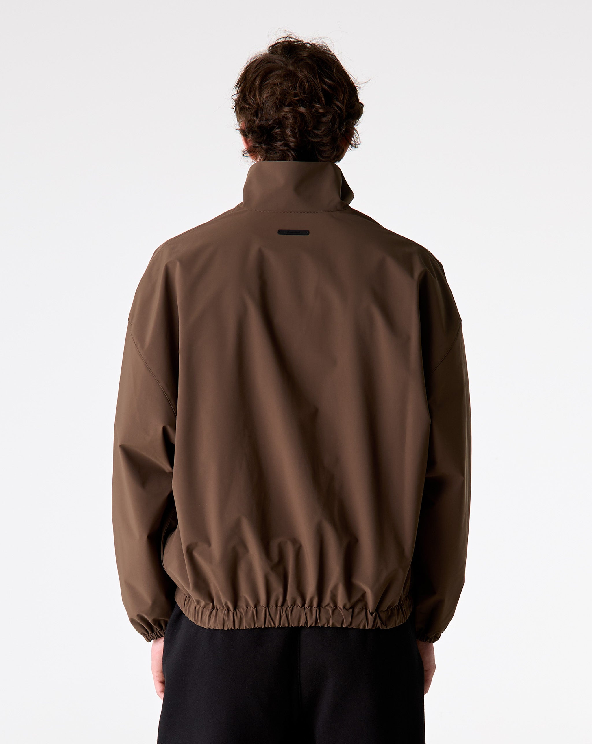 Fear of God Essentials Active Trace 1/2 Zip Track Jacket - XHIBITION