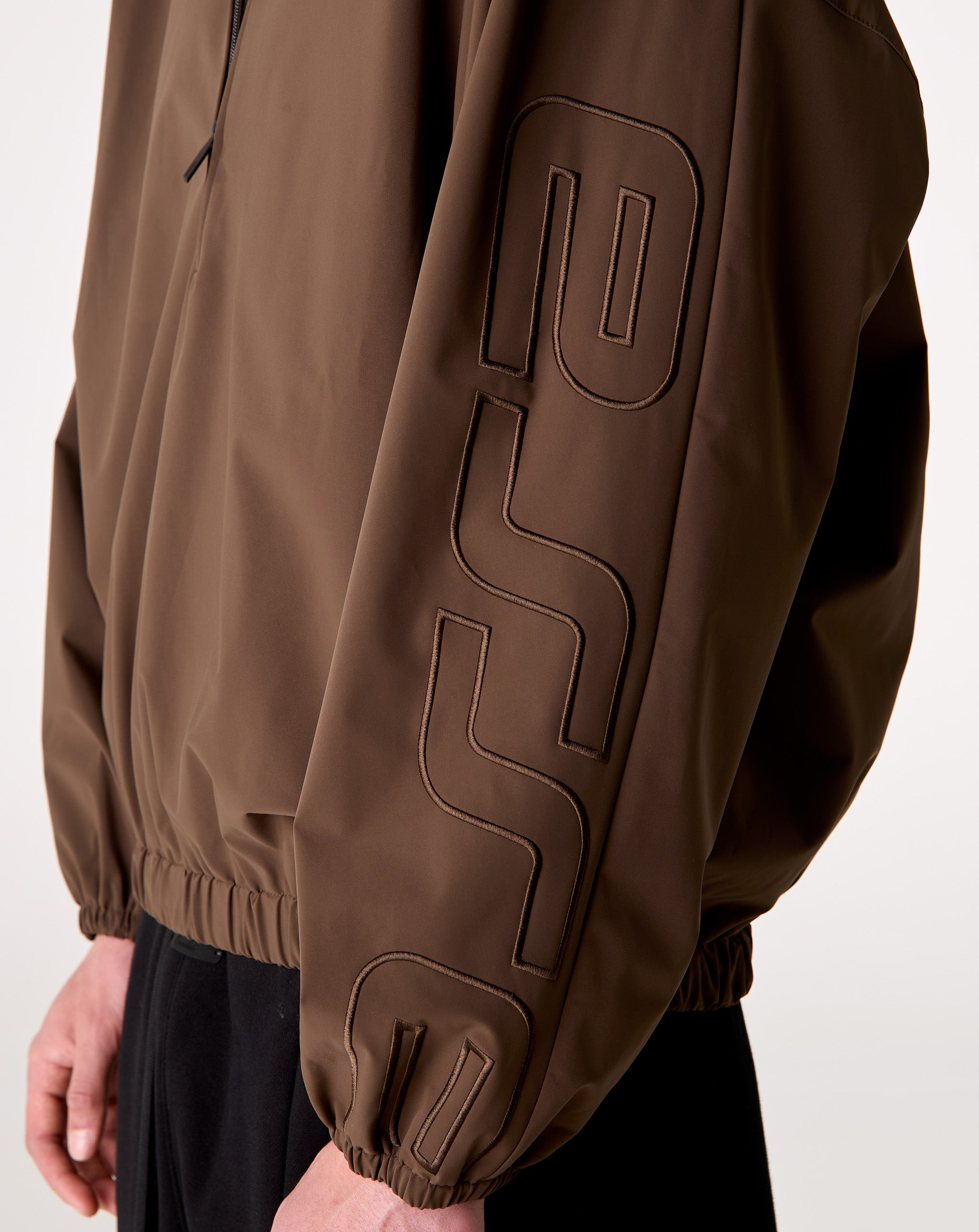 Fear of God Essentials Active Trace 1/2 Zip Track Jacket - XHIBITION