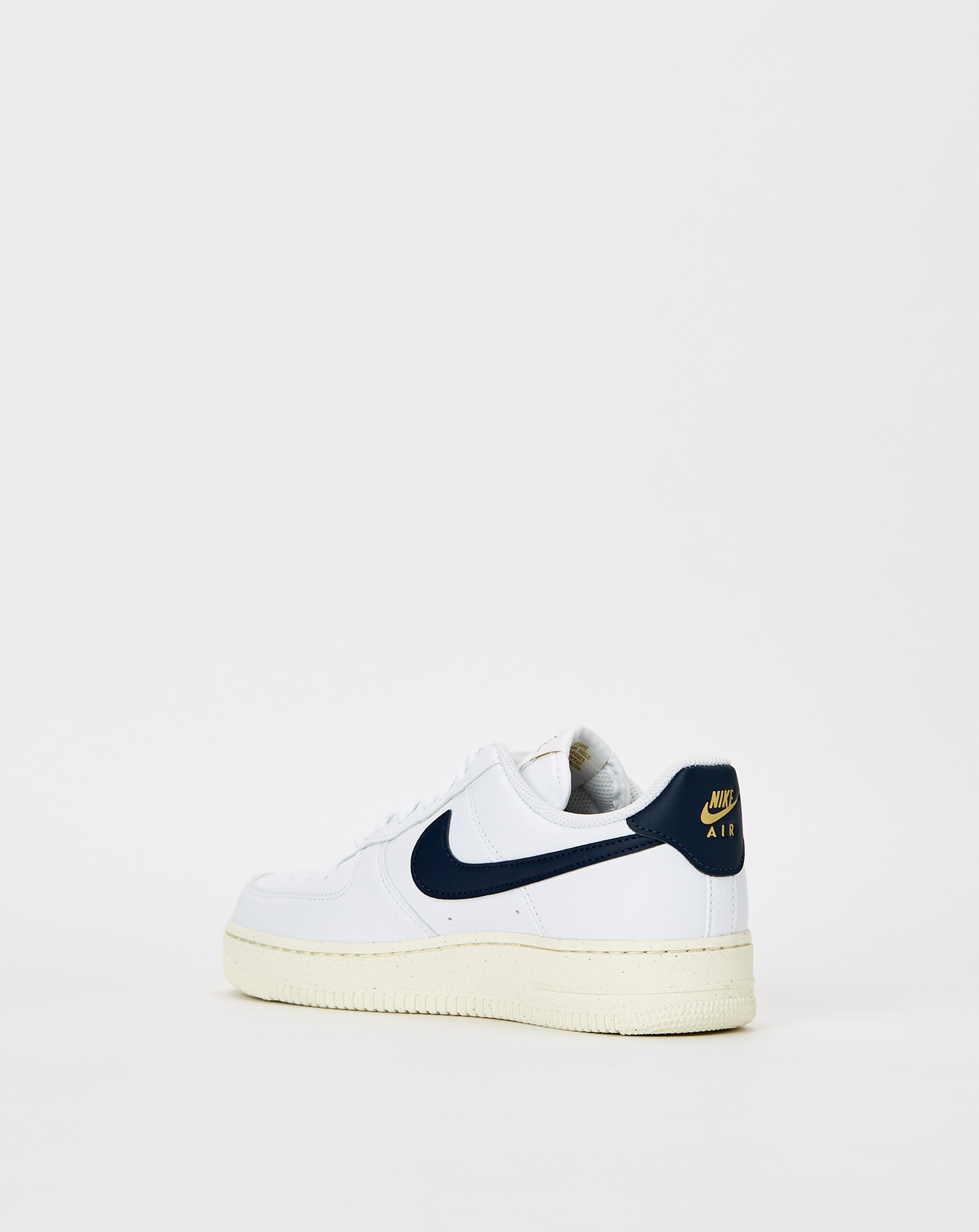 nike air force 1 sneakers with navy swoosh and gum sole